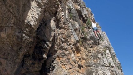 Rock climber loses footing mid-descent and takes a terrifying fall