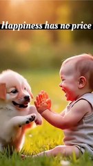 baby enjoying with puppy