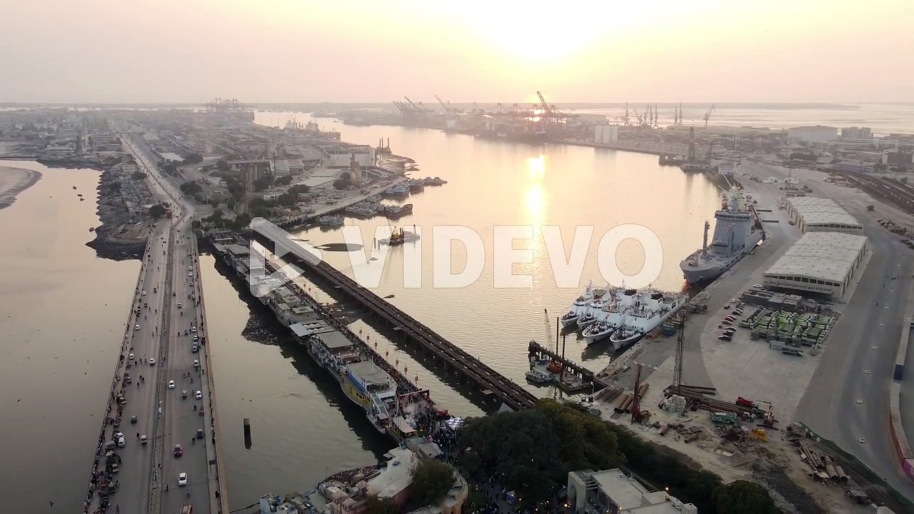 Aerial View Of Native Jetty Road With Karachi Port Terminal In Background During Sunset