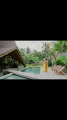 Woman Unexpectedly Topples Backward Into Pool