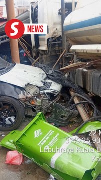 Two hurt after water truck crashes into houses, car in Pahang