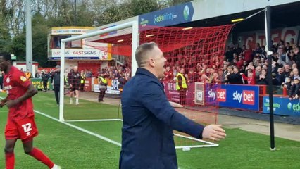 Scott Lindsey celebrates with fans after Bristol Rovers win