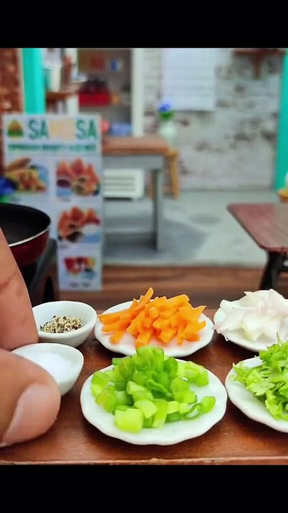 Making a spicy noodles in mini kitchen
