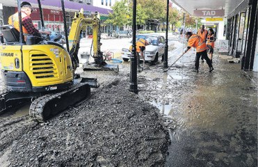 Burst water pipe floods High St