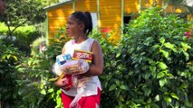 Mujer se lleva la mercancia por ser hermana de la colmadera    El Haitiano Compale