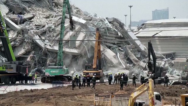 Rescuers search for survivors at collapsed building in Bangkok