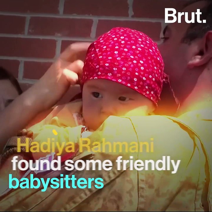 Soldiers Babysit Afghan Child At Kabul Airport