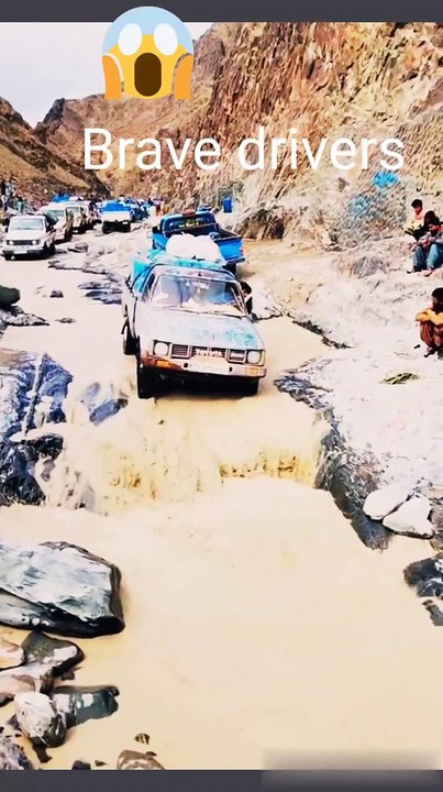 Brave drivers transporting petroleum on Toyota trucks on dangerous and risky roads in mountains