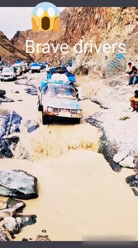 Brave drivers transporting petroleum on Toyota trucks on dangerous and risky roads in mountains