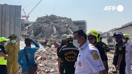 عمال عالقون في برج قيد الإنشاء في بانكوك انهار بعد زلزال قوي