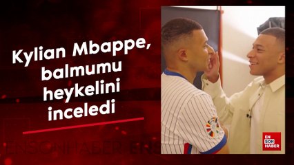 Kylian Mbappe, balmumu heykelini inceledi