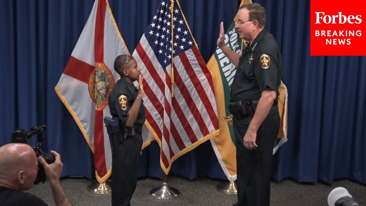 DJ Daniel Is Sworn In As Honorary Deputy Sheriff By Polk County Sheriff Grady Judd