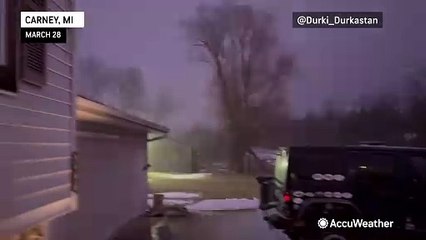 Hail pours down as storms strike the Upper Midwest