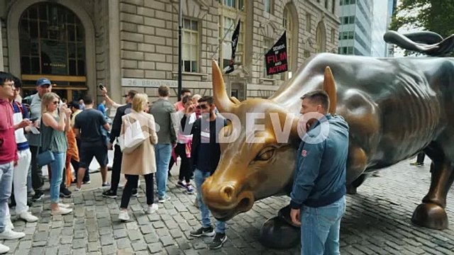 The Statue Of An Attacking Bull Also Known As A Bull On Wall Street Depicts A Powerful Enraged Bull