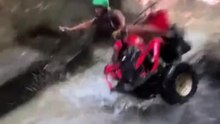 Girl Hits Rock While Riding ATV and Falls Into Water