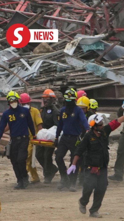 More bodies pulled from collapsed Bangkok building as death toll hits at least 18