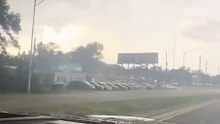Tornado flings truck into Florida roadway