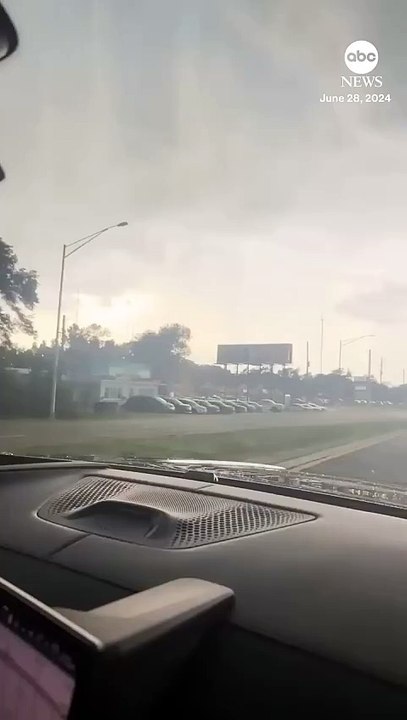 Tornado flings truck into Florida roadway