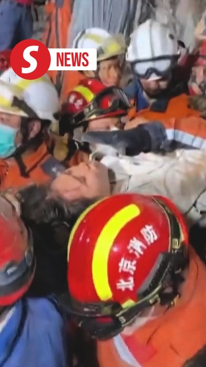 Woman pulled alive from Myanmar earthquake rubble; race to find more survivors