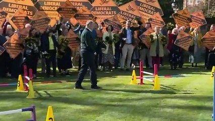 Sir Ed Davey horses around to launch local election campaign