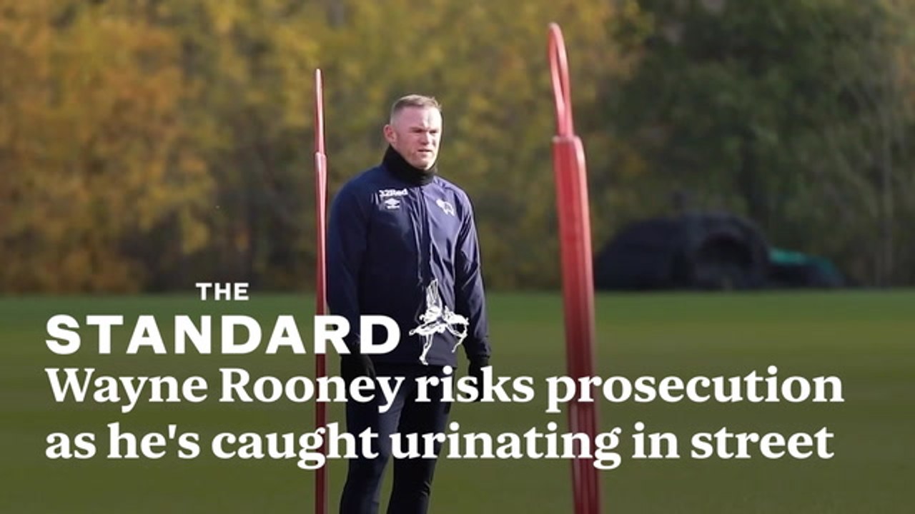 Wayne Rooney risks prosecution as he's caught urinating in street in London