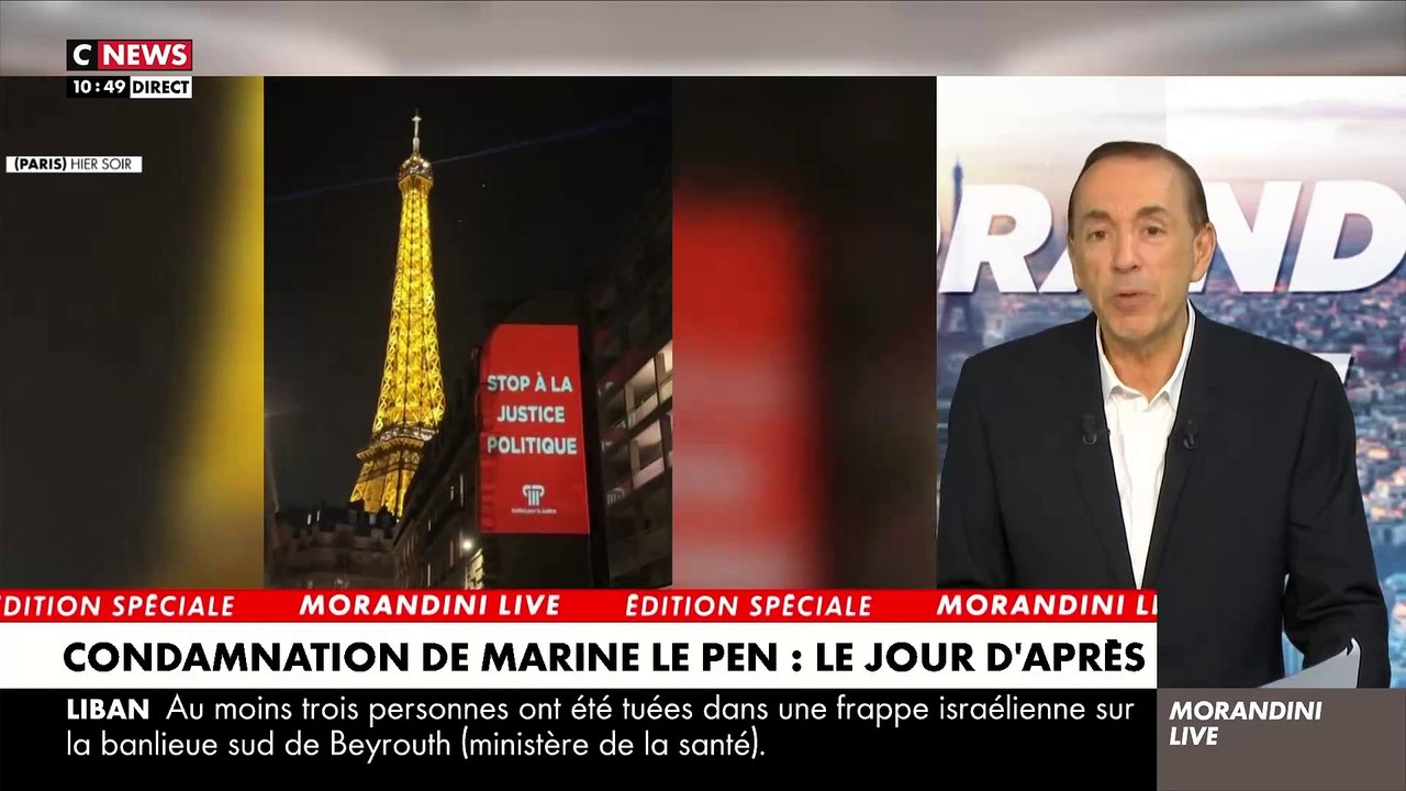 Marine Le Pen - Enquête sur le happening hier soir au pied de la Tour Eiffel dans "Morandini Live": Qui a organisé la projection de cette affiche "Stop à la justice politique" ? - VIDEO