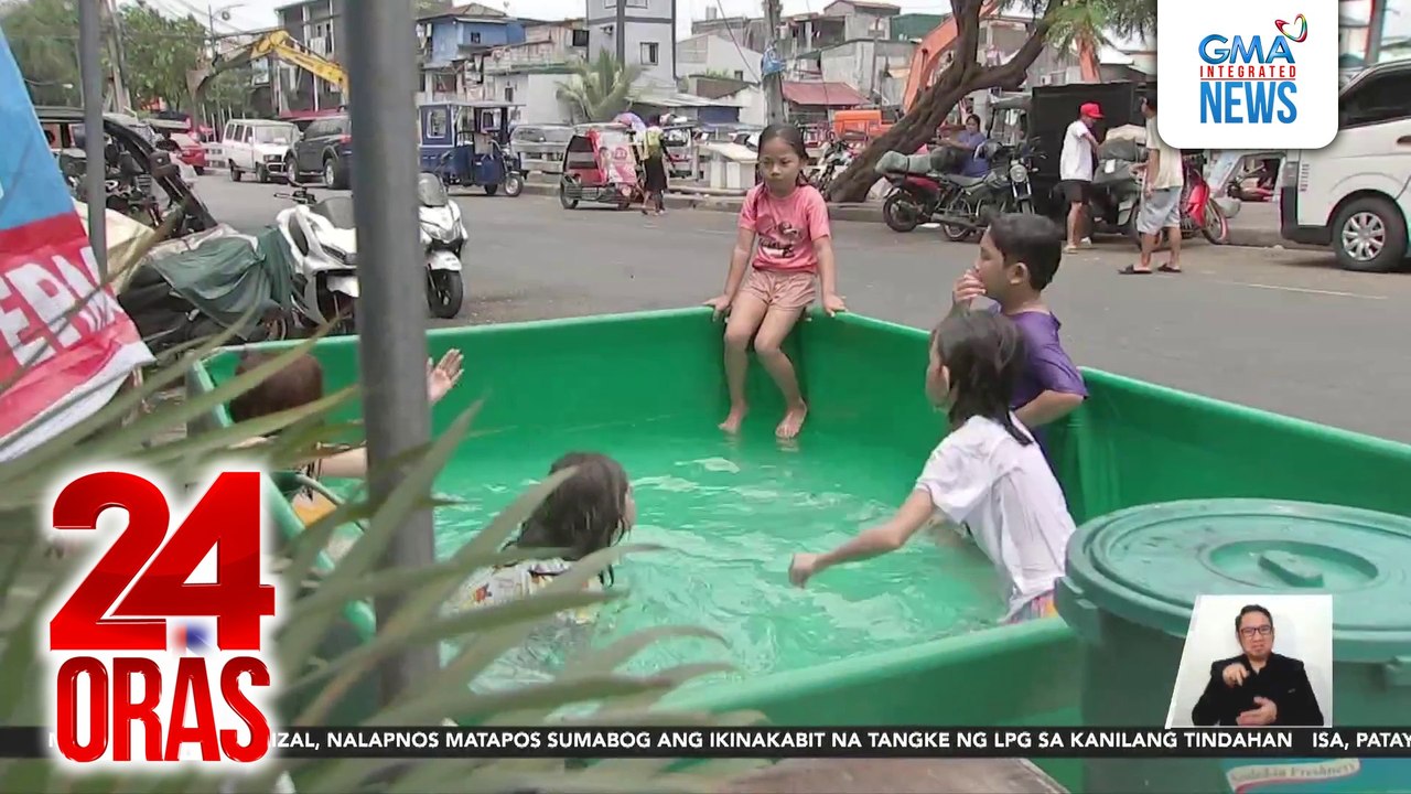 Ilang batang naligo sa bahagi ng Manila Bay, hindi alintana ang dumi ng tubig | 24 Oras