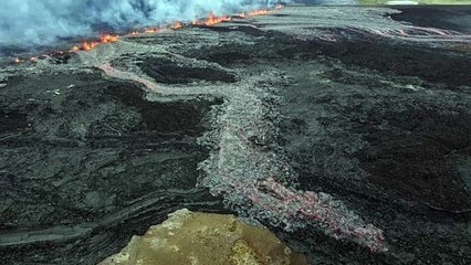 Lava spews from crater row as Icelandic village evacuated