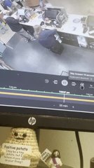 Woman Tries Sitting on Top of Two Boxes And Falls