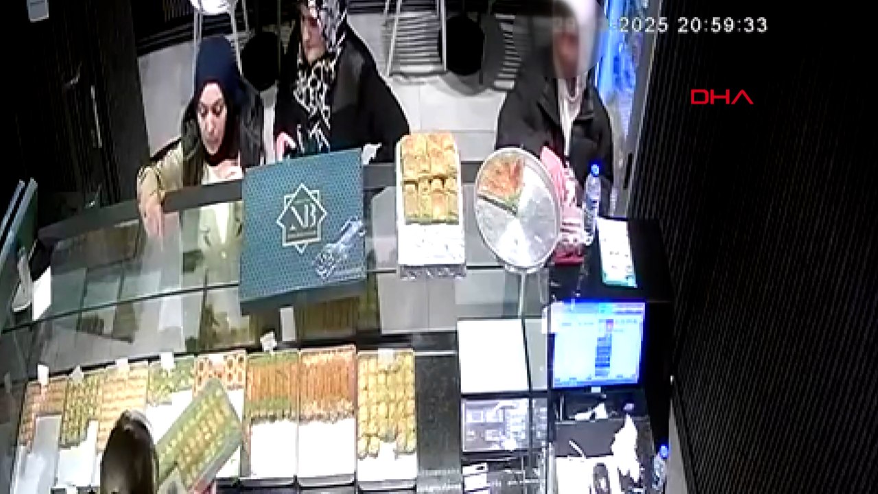 Dükkandaki sadaka kutusunu çalan şüpheli kamerada