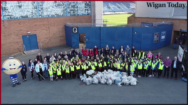 Wigan school pupils pick up litter from streets around the borough
