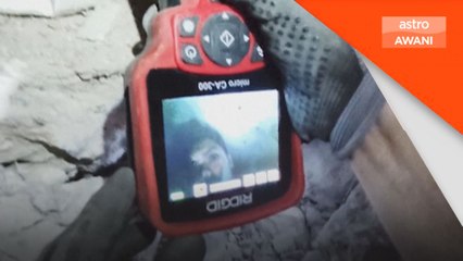 Dua lelaki diselamatkan di bawah runtuhan sebuah hotel