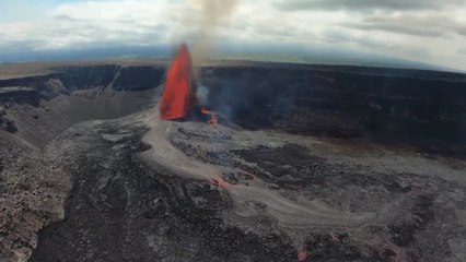 Aerial footage shows Hawaii's Kilauea volcano spewing lava more than 200 metres high