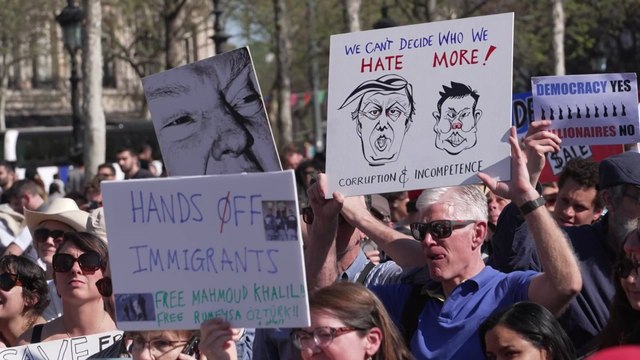 Paris demonstrators protest against U.S. President Trump's 'embarrassing' policies
