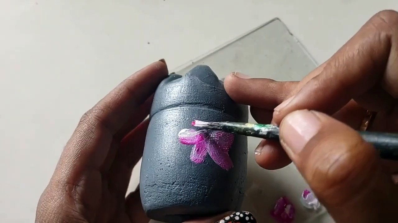 Make a cute table planter with soda bottle
