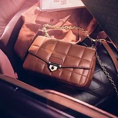 حقيبة SOHO من مايكل كورس تماشت مع ستايل المؤثّرات العربيات هذا الشتاء