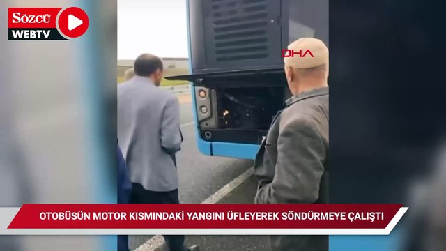 Otobüsün motor kısmındaki yangını üfleyerek söndürmeye çalıştı