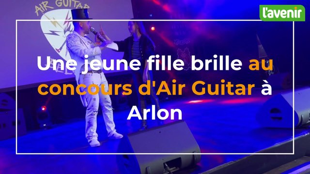 Une jeune fille brille au concours d'Air Guitar à Arlon lors de l'Arel Tattooshow