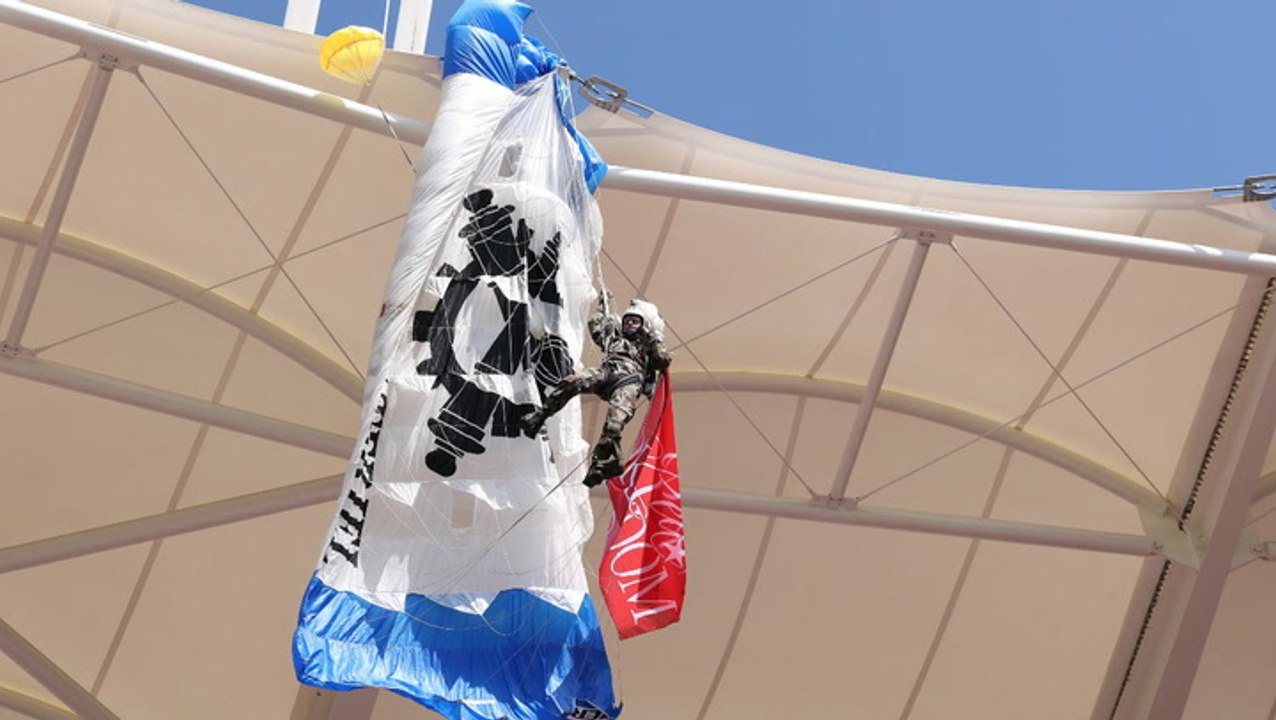 Parachutist left dangling from rugby stadium roof after crash