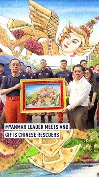 Myanmar leader meets and gifts Chinese rescuers