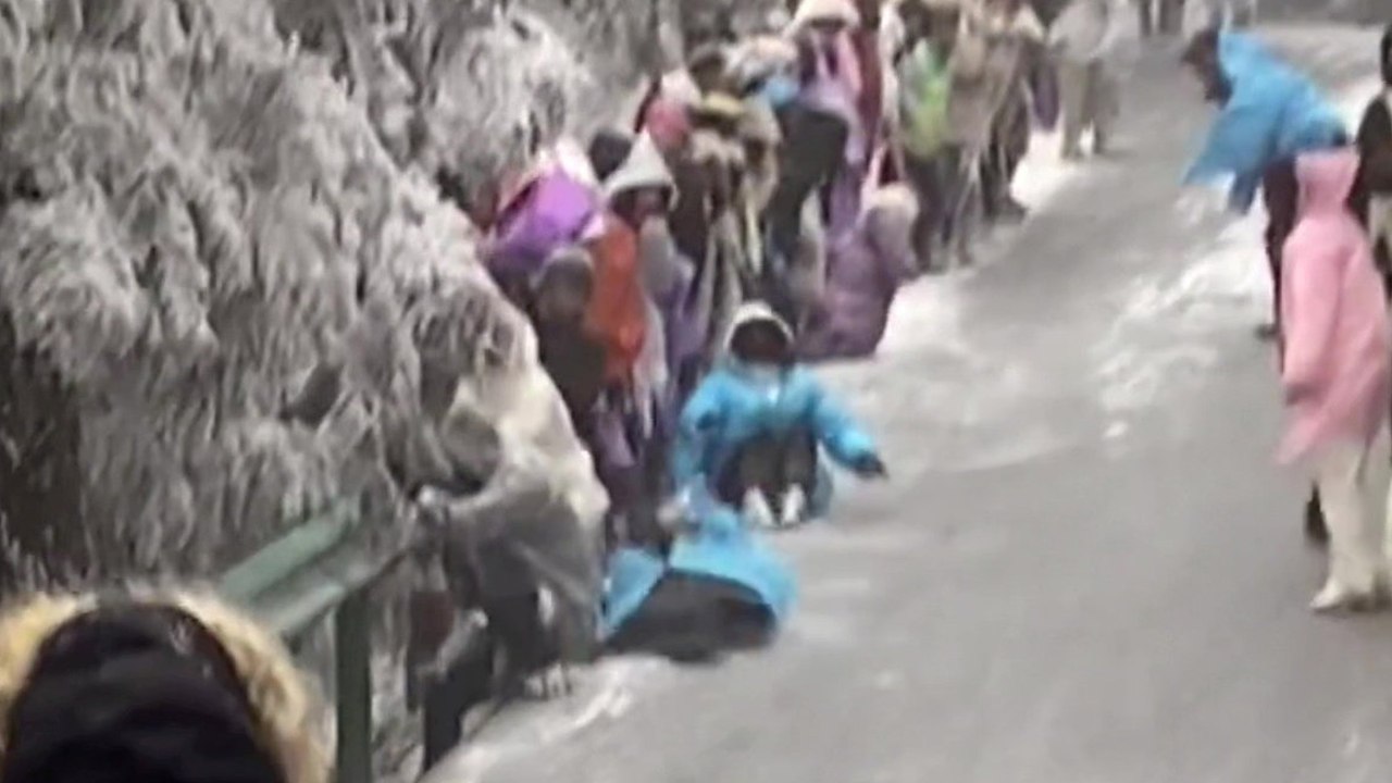 Icy slope sends hikers sliding down mountain