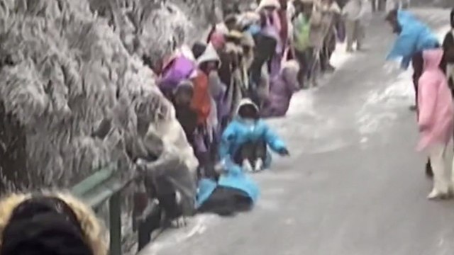 Icy slope sends hikers sliding down mountain