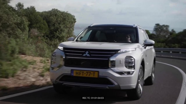 New Mitsubishi Outlander PHEV in White Diamond Driving Video