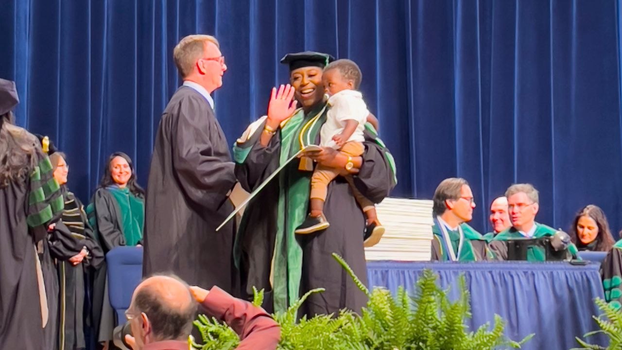 Pregnant Med Student Graduates With Baby In Arms | Happily TV