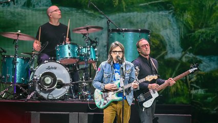 Weezer Still Playing Coachella After Bassist Scott Shriner's Wife Was Shot By Police | THR News Video
