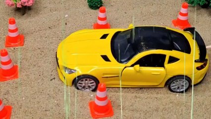 Miniature house made from small blocks with a car garage