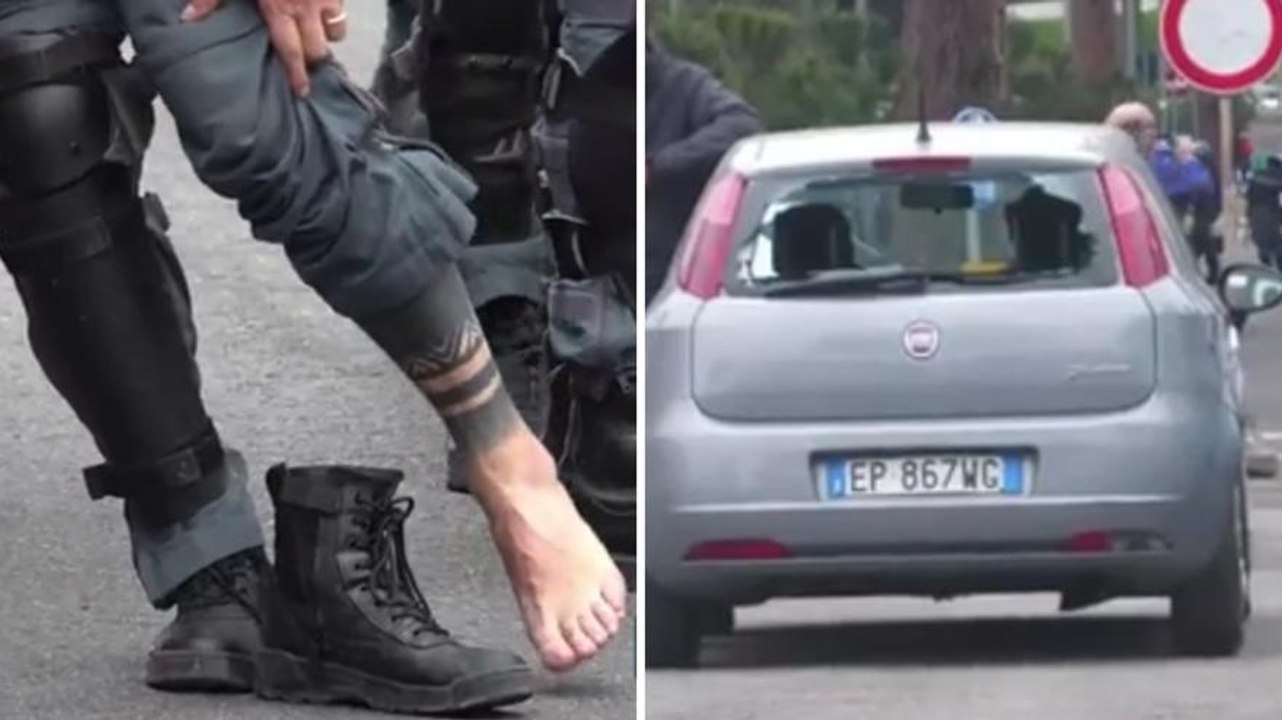 Derby Lazio-Roma, video scontri: poliziotto ferito a un piede, auto distrutta