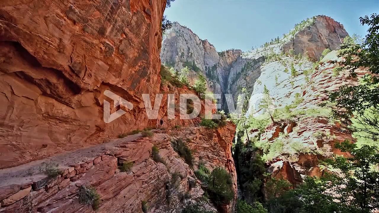 Tourists hike in Zion national Park Utah