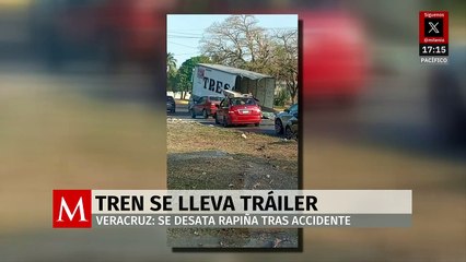 En carretera Veracruz-Xalapa, tráiler se parte a la mitad tras intentar ganarle el paso al tren
