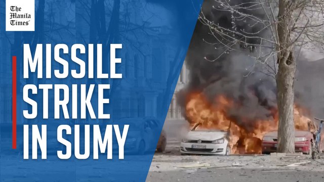 Emergency workers operate at site of missile strike in Sumy
